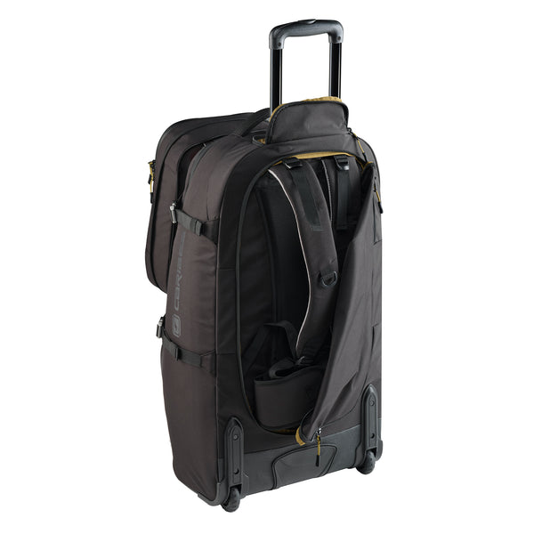 Black rolling suitcase with open compartment on a white background with backpack harness showing