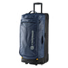 A blue Caribee Odyssey Hybrid 100L wheel travel bag with telescopic handle, top and side carry options, and all-terrain wheels.