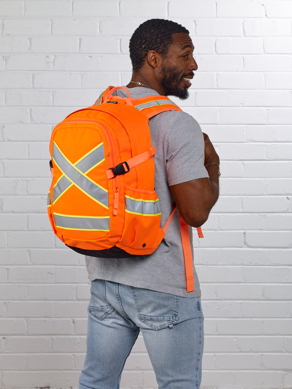 Caribee Switchback Hi Vis Orange backpack on model