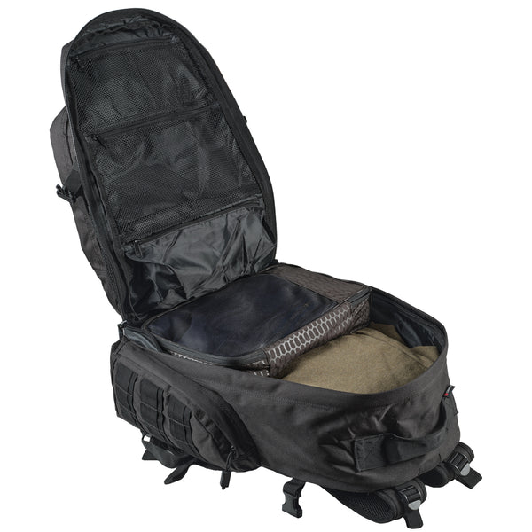 A black caribee op's tactical backpack shown open, displaying its interior compartments, mesh pockets, and padded compartments, set against a plain white background.