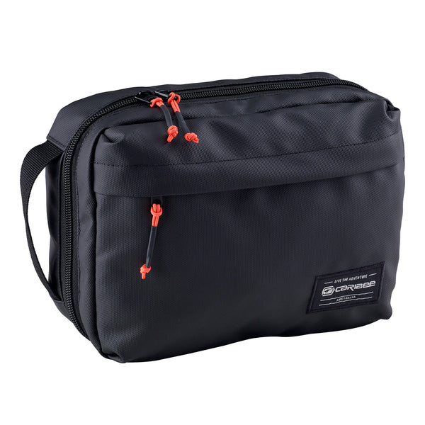 A black Caribee Adventure Toiletry Bag with orange zipper detailing and a webbing carry handle.